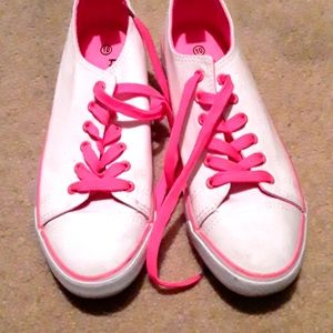 White canvas shoes with pink shoe string